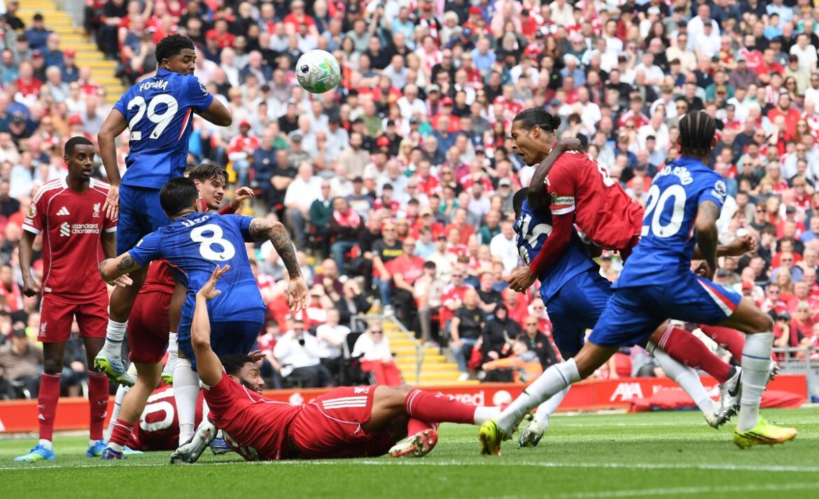 Liverpool FC players react after a 1-1 draw against Chelsea FC at Anfield in a Premier League match affecting Champions League qualification hopes.